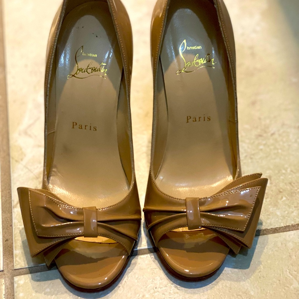 Christian Louboutin Heels . With bag, box and extra heel tip bag